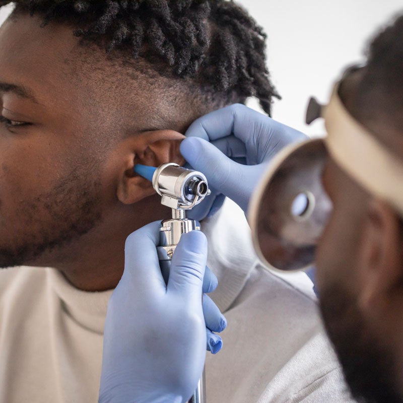 Healthcare expert checking a patient for hearing loss in Surprise, AZ